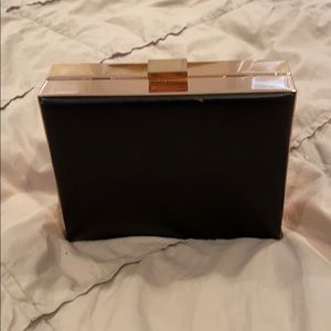 Small Black purse with gold accents